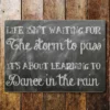 Metal Sign "Life isn't waiting for the storm to pass It's about learning to dance in the rain" 8x10