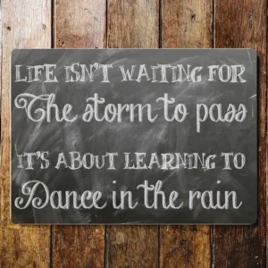 Metal Sign "Life isn't waiting for the storm to pass It's about learning to dance in the rain" 8x10